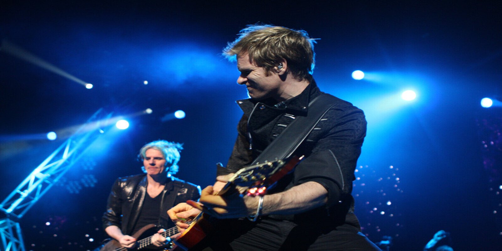 Duran Duran man playing guitar
